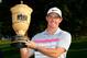 AKRON, OH - AUGUST 03: Rory McIlroy of Northern Ireland holds the Gary Player Cup trophy after winning the World Golf Championships-Bridgestone Invitational with a score of -15 during the final round at Firestone Country Club South Course on August 3, 20