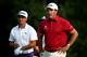 LOUISVILLE, KY - AUGUST 05: (L-R) Rickie Fowler of the United States and Phil Mickelson of the United States look on from a tee during a practice round prior to the start of the 96th PGA Championship at Valhalla Golf Club on August 5, 2014 in Louisville,