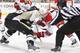 Staal and Sutter go head-to-head in a faceoff in an April 2014 meeting between the 'Canes and Penguins.