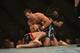 Apr 26, 2014; Baltimore, MD, USA; Luke Rockhold (top) Tim Boetschat grapple during the first round at Baltimore Arena. Rockhold defeated Boetsch by submission in the first round Mandatory Credit: Tommy Gilligan-USA TODAY Sports