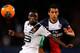 PARIS, FRANCE - MAY 07: Marquinhos of PSG and Paul-Georges Ntep de Madiba of Rennais battle for the ball during the Ligue 1 match between Paris Saint-Germain FC and Stade Rennais FC at Parc des Princes on May 7, 2014 in Paris, France. (Photo by Dean Mou