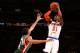 NEW YORK, NY - MARCH 15: Iman Shumpert #21 of the New York Knicks shoots against Giannis Antekounmpo #34 of the Milwaukee Bucks during a game at Madison Square Garden in New York City. NOTE TO USER: User expressly acknowledges and agrees that, by download