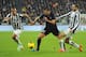 TURIN, ITALY - FEBRUARY 02: Saphir Slitti Taider (C) of FC Internazionale Milano is challenged by Arturo Vidal (L) and Giorgio Chiellini of Juventus during the Serie A match between Juventus and FC Internazionale Milano at Juventus Arena on February 2, 2