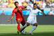 BELO HORIZONTE, BRAZIL - JUNE 17: Moussa Dembele of Belgium and Saphir Taider of Algeria battle for the ball during the 2014 FIFA World Cup Brazil Group H match between Belgium and Algeria at Estadio Mineirao on June 17, 2014 in Belo Horizonte, Brazil.