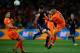 JOHANNESBURG, SOUTH AFRICA - JULY 11: Nigel De Jong of the Netherlands tackles Xabi Alonso of Spain during the 2010 FIFA World Cup South Africa Final match between Netherlands and Spain at Soccer City Stadium on July 11, 2010 in Johannesburg, South Afric