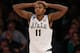 NEW YORK, NY - MARCH 30: Keith Appling #11 of the Michigan State Spartans reacts against the Connecticut Huskies during the East Regional Final of the 2014 NCAA Men's Basketball Tournament at Madison Square Garden on March 30, 2014 in New York City. (Ph