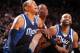 HOUSTON, TX - DECEMBER 23: Terrence Jones #6 of the Houston Rockets and Shawn Marion #0 and Vince Carter #25 of the Dallas Mavericks battle for the rebound on December 23, 2013 at the Toyota Center in Houston, Texas. NOTE TO USER: User expressly acknowle