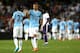 AL AIN, UNITED ARAB EMIRATES - MAY 15: Matija Nastasic and Gael Clichy of Manchester City celebrate the goal of team mate Maroc Lopes during the friendly match between Al Ain and Manchester City at Hazza bin Zayed Stadium on May 15, 2014 in Al Ain, Unite