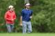 CHARLOTTE, NC - MAY 02: Rory McIlroy of Northern Ireland walks down the 9th fairway with Bubba Watson during the first round of the Wells Fargo Championship at Quail Hollow Club on May 2, 2013 in Charlotte, North Carolina. (Photo by Streeter Lecka/Getty