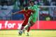 SION, SWITZERLAND - MAY 31: Saphir Taider of Algeria (R) fights for the ball with Norair Aslanyan of Armenia during the international friendly match between Algeria and Armenia at Estadio Tourbillon on May 31, 2014 in Sion, Switzerland. (Photo by Philipp