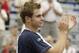 MONTREAL - AUGUST 10: Andy Roddick of the USA applauds as he walks up to the championship trophys after he defeated David Nalbandian of Argentina during the Tennis Masters Canada on August 10, 2003 at Maurier Stadium in Montreal, Quebec. Roddick defeate