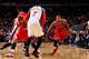 CHICAGO, IL - MARCH 12: Derrick Rose #1 of the Chicago Bulls drives on a screen by teammate Jimmy Butler #21 against Carmelo Anthony #7 and Jeremy Lin #17 of the New York Knicks on March 12, 2012 at the United Center in Chicago, Illinois. NOTE TO USER: U