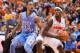 SYRACUSE, NY - JANUARY 11: J.P. Tokoto #13 of the North Carolina Tar Heels defends C.J. Fair #5 of the Syracuse Orange as he drives along the baseline in the first half on January 11, 2014 at The Carrier Dome in Syracuse, New York. (Photo by Brett Carlse
