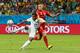 SALVADOR, BRAZIL - JULY 01: Julian Green of the United States scores his team's first goal in extra time against Toby Alderweireld of Belgium during the 2014 FIFA World Cup Brazil Round of 16 match between Belgium and the United States at Arena Fonte Nova