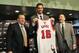 Jul 18, 2014; Chicago, IL, USA; Chicago Bulls head coach Tom Thibodeau (left) and general manager Gar Forman (right) pose for a photo with newly signed center Pau Gasol during a press conference at the United Center. Mandatory Credit: David Banks-USA TOD
