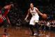 BROOKLYN, NY - MAY 12: Shaun Livingston #14 of the Brooklyn Nets handles the ball against LeBron James #6 of the Miami Heat in Game Four of the Eastern Conference Semifinals during the 2014 NBA Playoffs on May 12, 2014 at Barclays Center in Brooklyn. NOTE