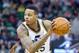 Jan 10, 2014; Salt Lake City, UT, USA; Utah Jazz shooting guard Brandon Rush (25) controls the ball during the second half against the Cleveland Cavaliers at EnergySolutions Arena. The Cavaliers won 113-102. Mandatory Credit: Russ Isabella-USA TODAY Sport