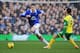 LIVERPOOL, ENGLAND - JANUARY 11: John Stones of Everton goes past Ricky van Wolfswinkel of Norwich City during the Barclays Premier League match between Everton and Norwich City at Goodison Park on January 11, 2014 in Liverpool, England. (Photo by Chris