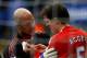 BOLTON, UNITED KINGDOM - NOVEMBER 15: Daniel Agger of Liverpool is comforted by Pepe Reina as he holds his tooth in his hand after hitting the post and knocking it out during the Barclays Premier League match between Bolton Wanderers and Liverpool at The