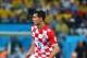 Jun 12, 2014; Sao Paulo, BRAZIL; Croatia defender Dejan Lovren (6) heads the ball against Brazil in the opening game of the 2014 World Cup at Arena Corinthians. Brazil defeated Croatia 3-1. Mandatory Credit: Mark J. Rebilas-USA TODAY Sports