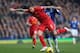 LIVERPOOL, ENGLAND - NOVEMBER 23: Daniel Agger of Liverpool competes with Romelu Lukaku of Everton during the Barclays Premier League match between Everton and Liverpool at Goodison Park on November 23, 2013 in Liverpool, England. (Photo by Clive Brunsk