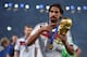 RIO DE JANEIRO, BRAZIL - JULY 13: Sami Khedira of Germany celebrates with the World Cup trophy after defeating Argentina 1-0 in extra time during the 2014 FIFA World Cup Brazil Final match between Germany and Argentina at Maracana on July 13, 2014 in Ri