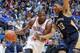 TULSA, OK - OCTOBER 17: Kevin Durant #35 of the Oklahoma City Thunder drives to the basket against Anthony Davis #23 of the New Orleans Pelicans on October 17, 2013 at the BOK Center in Tulsa, Oklahoma. NOTE TO USER: User expressly acknowledges and agree