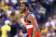 INDIANAPOLIS, IN - MAY 13: John Wall #2 of the Washington Wizards celebrates in the 102-79 win over the Indiana Pacers in Game 5 of the Eastern Conference Semifinals during the 2014 NBA Playoffs at Bankers Life Fieldhouse on May 13, 2014 in Indianapolis,