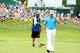 LOUISVILLE, KY - AUGUST 07: Lee Westwood of England and caddie Billy Foster walk off the 18th hole during the first round of the 96th PGA Championship at Valhalla Golf Club on August 7, 2014 in Louisville, Kentucky. (Photo by Andrew Redington/Getty Image