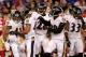 BALTIMORE, MD - AUGUST 07: Defensive back Dominique Franks #42 of the Baltimore Ravens (L) celebrates with teammates after intercepting a pass against the San Francisco 49ers during the first second half of an NFL pre-season game at M&T Bank Stadium on A