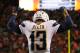 DENVER, CO - JANUARY 12: Keenan Allen #13 of the San Diego Chargers celebrates a fourth quarter touchdown against the Denver Broncos during the AFC Divisional Playoff Game at Sports Authority Field at Mile High on January 12, 2014 in Denver, Colorado. (