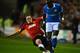WIGAN, ENGLAND - APRIL 11: Phil Jones of Manchester United injures himself in a tackle on Mohamed Diame of Wigan during the Barclays Premier League match between Wigan Athletic and Manchester United at the DW Stadium on April 11, 2012 in Wigan, England.