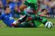 BIRKENHEAD, ENGLAND - AUGUST 06: Leighton Baines (L) of Everton challenges Alejandro Lopez Sanchez of Celta Vigo during the Pre-Season Friendly between Everton and Celta Vigo at Prenton Park on August 6, 2014 in Birkenhead, England. (Photo by Dave Thompso