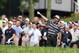 Bubba Watson lets the crowd know he's hit an errant shot Friday.