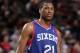 PORTLAND, OR - JANUARY 4: Thaddeus Young #21 of the Philadelphia 76ers stands on the court against the Portland Trail Blazers on January 4, 2014 at the Moda Center Arena in Portland, Oregon. NOTE TO USER: User expressly acknowledges and agrees that, by d