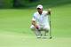 LOUISVILLE, KY - AUGUST 08: Jason Day of Australia lines up a putt during the second round of the 96th PGA Championship at Valhalla Golf Club on August 8, 2014 in Louisville, Kentucky. (Photo by Jeff Gross/Getty Images)