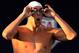 IRVINE, CA - AUGUST 08: Michael Phelps prepares to swim in the Men's 100 Meter Butterfly Final during the 2014 Phillips 66 National Championships at the Woollett Aquatic Center on August 8, 2014 in Irvine, California. (Photo by Harry How/Getty Images)