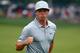 LOUISVILLE, KY - AUGUST 08: Rory McIlroy of Northern Ireland celebrates an eagle putt on the 18th green during the second round of the 96th PGA Championship at Valhalla Golf Club on August 8, 2014 in Louisville, Kentucky. (Photo by Sam Greenwood/Getty I