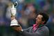 McIlroy beaming at the Claret Jug after winning the 2014 British Open.