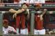Until Joey Votto (left) gets back on the field, he's staying off the Board.
