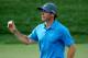 LOUISVILLE, KY - AUGUST 09: Rory McIlroy of Northern Ireland waves on the 16th green during the third round of the 96th PGA Championship at Valhalla Golf Club on August 9, 2014 in Louisville, Kentucky. (Photo by Warren Little/Getty Images)