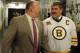 BOSTON, MA - MARCH 24: Head Coach Claude Julien of the Boston Bruins chats with former player and legend Ray Bourque before the puck drop against the Montreal Canadiens at the TD Garden on March 24, 2014 in Boston, Massachusetts. (Photo by Steve Babineau