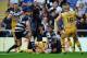 LEIGH, ENGLAND - AUGUST 10: Daryl Clark of Castleford Tigers goes over for a try during the Tetley's Challenge Cup Semi Final match between Widnes Vikings and Castleford Tigers at Leigh Sports Village on August 10, 2014 in Leigh, England. (Photo by Chris