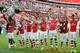 LONDON, ENGLAND - AUGUST 10: Alexis Sanchez of Arsenal lifts the trophy next (L-R) Santi Cazorla, Aaron Ramsey, Tomas Rosicky, Mathieu Flamini, Nacho Monreal, Jack Wilshere and Calum Chambers after the FA Community Shield match between Manchester City an