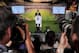 MADRID, SPAIN - JULY 22: James Rodriguez holds his new Real shirt during his unveiling as a new Real Madrid player at the Santaigo Bernabeu stadium on July 22, 2014 in Madrid, Spain. Real agreed to buy Rodriguez from AS Monaco for the next six seasons fo