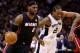 SAN ANTONIO, TX - JUNE 15: LeBron James #6 of the Miami Heat drives to the basket against Kawhi Leonard #2 of the San Antonio Spurs during Game Five of the 2014 NBA Finals at the AT&T Center on June 15, 2014 in San Antonio, Texas. NOTE TO USER: User expr
