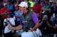 LOUISVILLE, KY - AUGUST 10: Rory McIlroy of Northern Ireland celebrates his one-stroke victory on the 18th green during the final round of the 96th PGA Championship at Valhalla Golf Club on August 10, 2014 in Louisville, Kentucky. (Photo by Andrew Redin