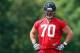 FLOWERY BRANCH, GA - MAY 16: Rookie offensive tackle Jake Matthews #70 of the Atlanta Falcons runs drills during rookie minicamp at the Atlanta Falcons Training Facility on May 16, 2014 in Flowery Branch, Georgia. (Photo by Kevin C. Cox/Getty Images)