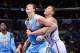 LOS ANGELES, CA - APRIL 15: Timofey Mozgov #25 of the Denver Nuggets battles for position against Blake Griffin #32 of the Los Angeles Clippers at Staples Center on April 15, 2014 in Los Angeles, California. NOTE TO USER: User expressly acknowledges and a