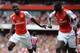 LONDON, ENGLAND - AUGUST 02: Joel Campbell of Arsenal celebrates scoring with Yaya Sanogo during the Emirates Cup match between Arsenal and Benfica at the Emirates Stadium on August 2, 2014 in London, England. (Photo by Michael Regan/Getty Images)